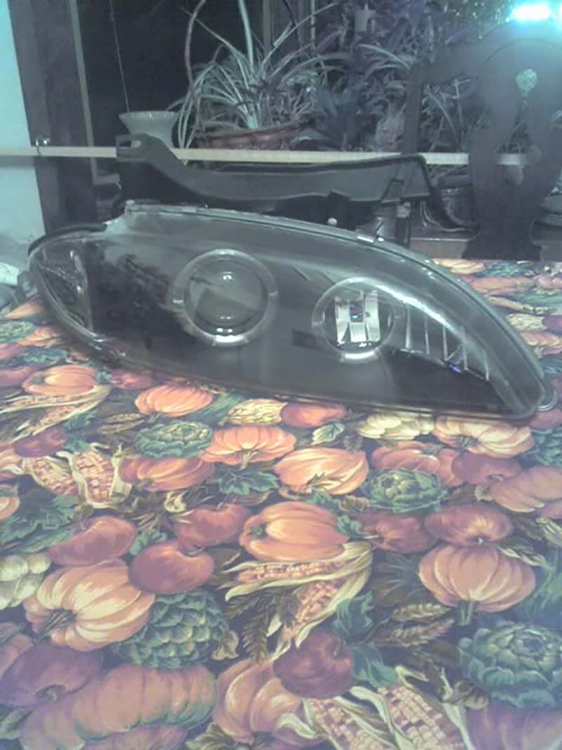 Chevrolet Cavalier Black One-Piece Projector Headlights